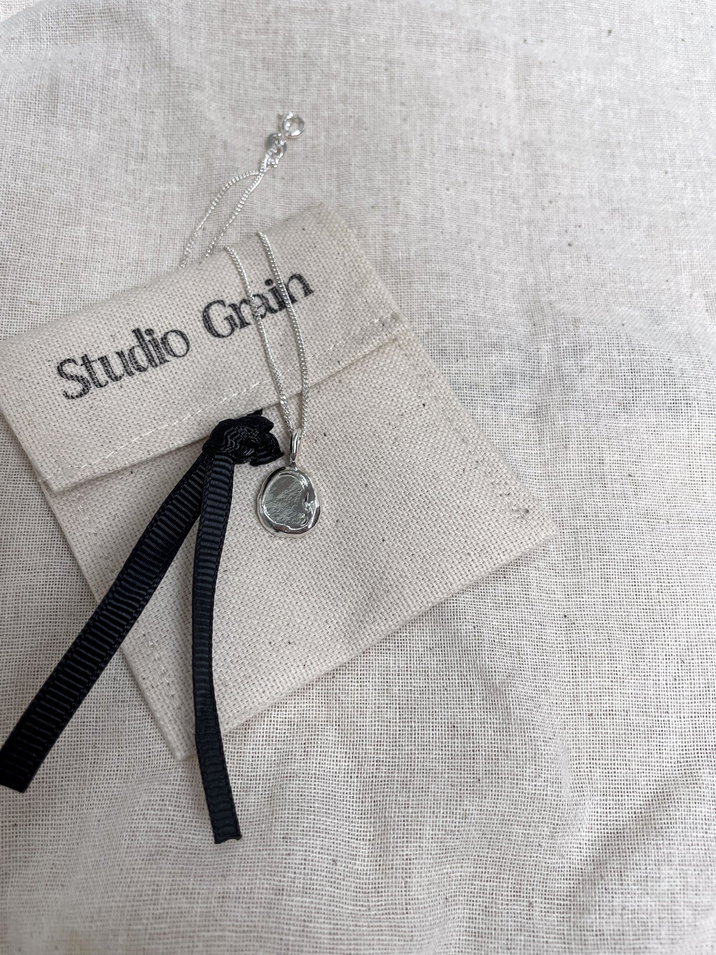 Mini Ripple Pendant Necklace