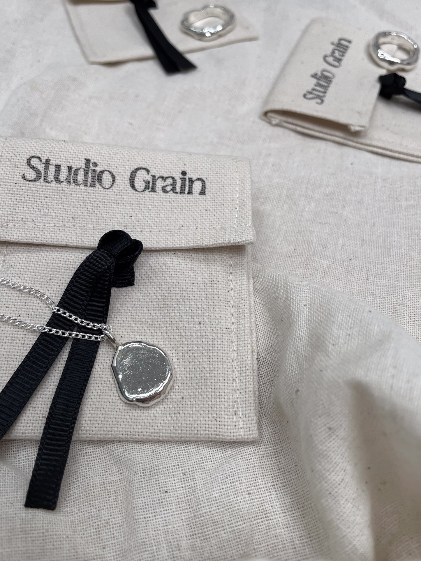 Ripple Pendant Necklace